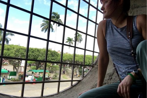 Image of me looking out from Granada Cathedral onto Parque Centrale in Granada, Nicaragua.