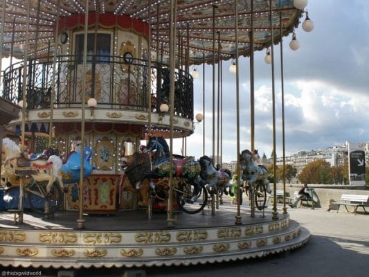 Image of carousel near the Eiffel Tower in Paris.