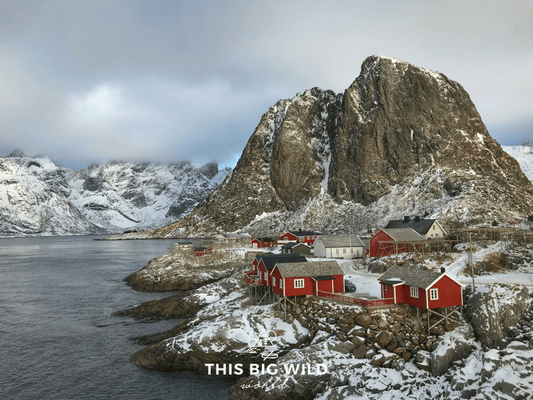 Explore the stunning landscape of the Lofoten Islands, Norway. Hamnoy is a fishing village with the iconic red fisherman's cabins along the fjords.