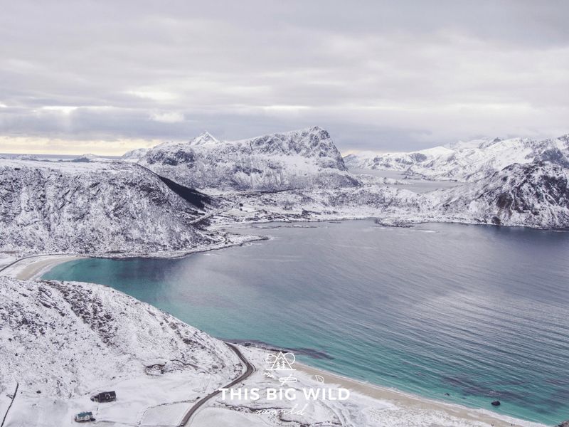 Capture a beautiful view of Haukland Beach from above by hiking Mannen in the Lofoten Islands Norway.