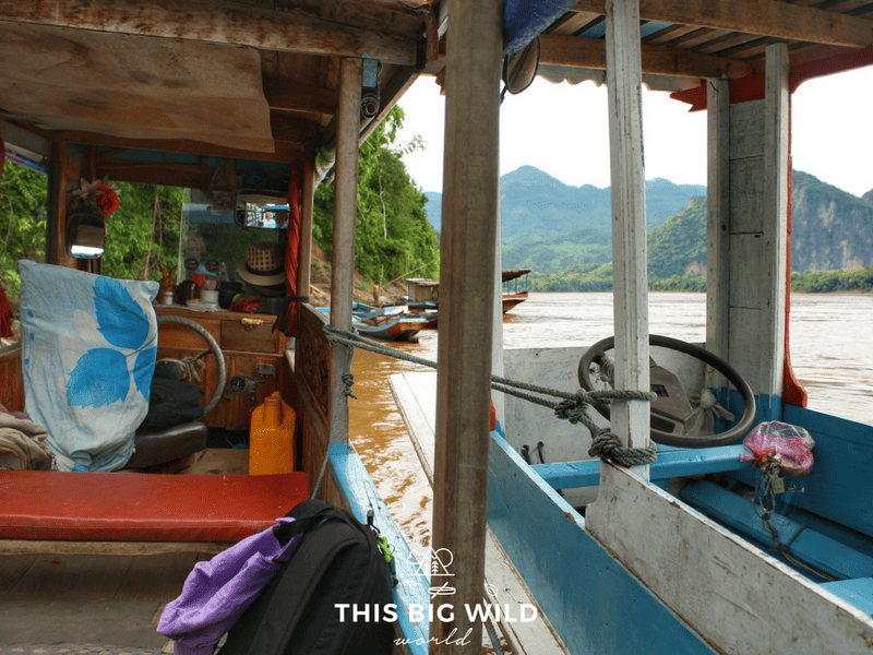 When the long boat captain's friend came to save the day on his own long boat near Luang Prabang in Laos.