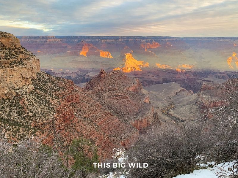 Enjoy the sunrise over the Grand Canyon while on your Arizona road trip.