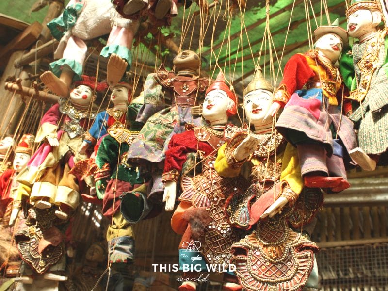 Visit the Bagan Traditional Market to buy local good and foods like these puppets.