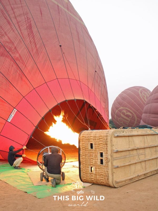 Watch the hot air balloon prepare for takeoff at sunrise in Bagan Myanmar.