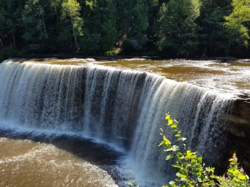 Tahquamenon Falls State Park in Michigan has something for everyone and is open all year round! Photo by April from Minivan Adventures.