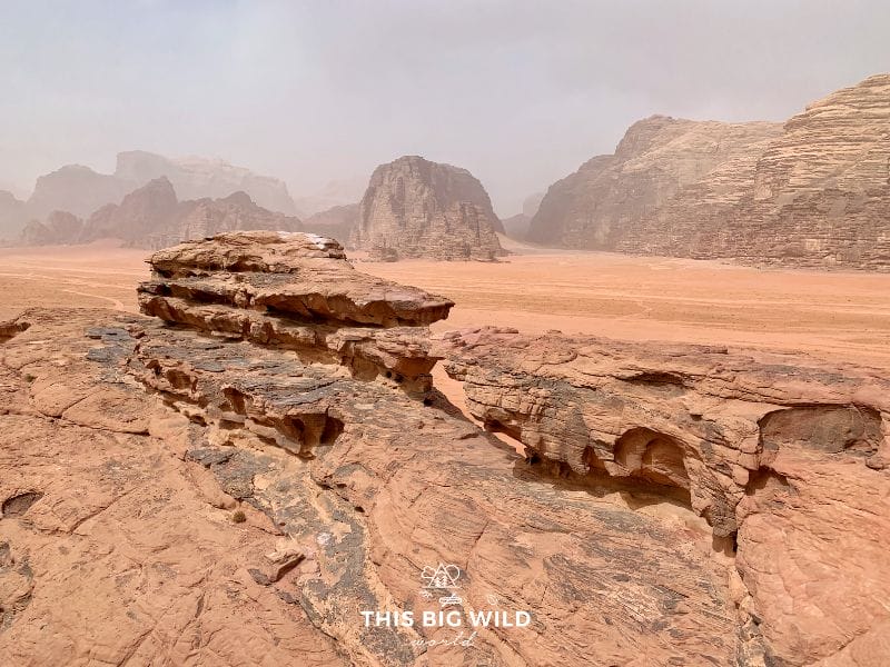 Little Rock Bridge in Wadi Rum may not be tall but it gives you mighty views of the surrounding mountains and red sand desert.