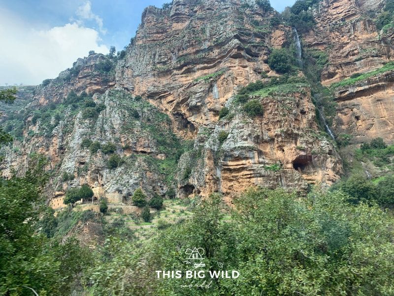 Explore ancient Christian monasteries carved into the caves and rock walls of Qadisha Valley in Lebanon.