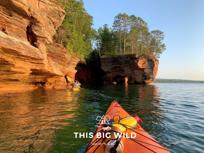 Kayak along the red sandstone cliffs and through the arches of the Apostle Islands sea caves on Lake Superior.
