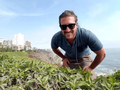 Paul from Travel is Life on the beaches of Lima in Peru. He shares how the book 'Grass' inspired his sense of adventure.