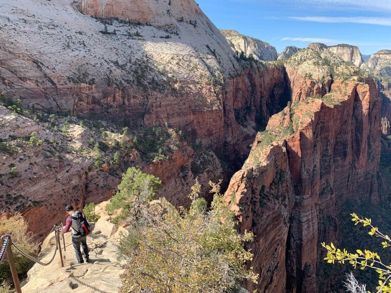 Angel's Landing is a popular hiking trail, but also one of the most dangerous hikes in the US. The final section requires hikers to climb a narrow ridge holding onto chains to reach the landing. Photo Credit: Lisa Landry