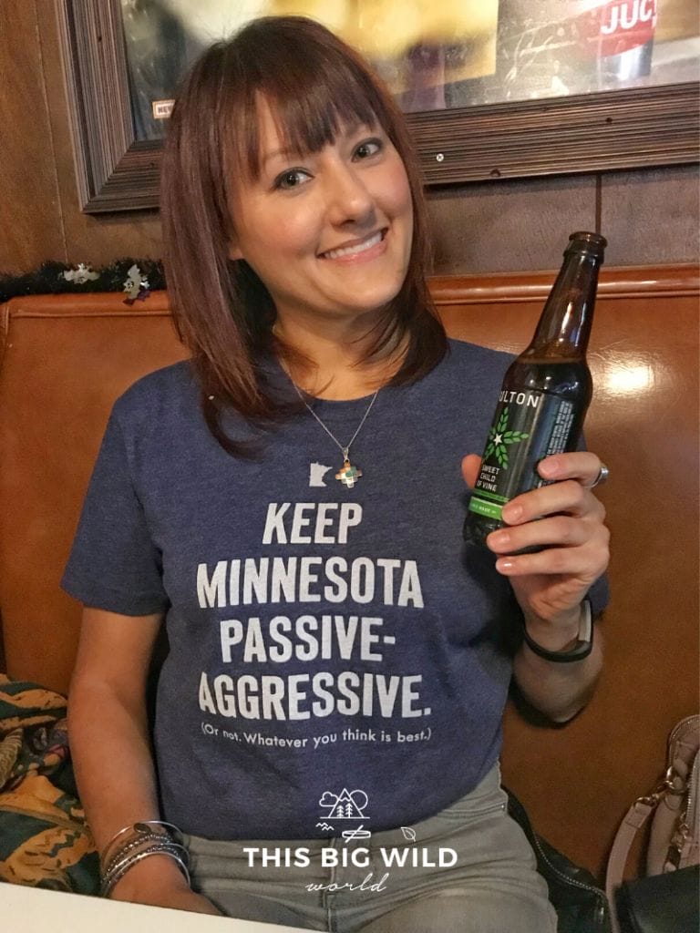 My shirt reads "Keep Minnesota passive aggressive. (Or not, whatever you think is best.)" and I'm drinking local beer from Fulton brewery.