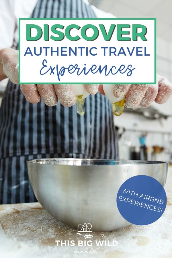 Text: Discover Authentic Travel Experiences - with Airbnb Experiences!
Image: Up close shot of a metal bowl on a flour covered wooden surface. Above it is a person in a blue striped apron with their hands cracking an egg into the bowl. A white kitchen is visible in the background. 