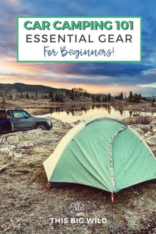Text in large box at top of image: Car Camping 101 Essential Gear for Beginners!
Image in background: Moody blue and pink sky, dark mountains in the background reflected into a small lake. In the foreground is a great tent with a gray SUV to the left.