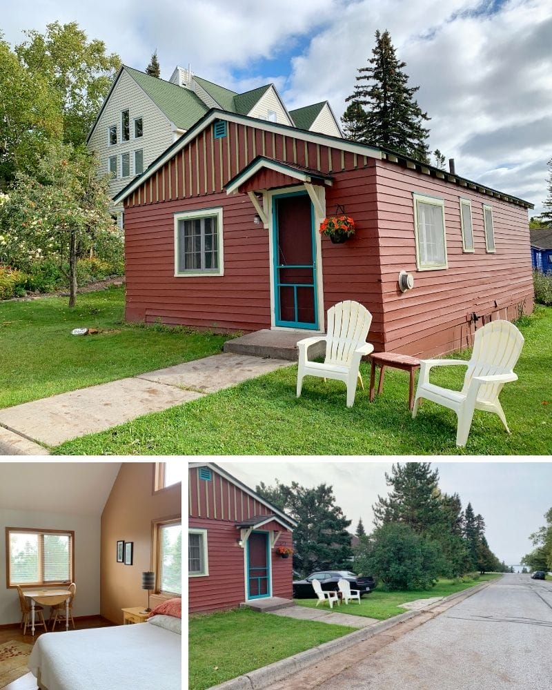 Top: Small red cabin with two white lawn chairs in the grass out front. A small pot of flowers hangs next to the bright blue screen door. Behind tall beige home, which is the bed and breakfast.
Bottom left: A queen size bed with white duvet sits along a tall tan wall of windows looking out onto trees. A small two person table is against the wall to the left.
Bottom right: The small red cabin is on the left. On the right is the street, which leads straight down to Lake Superior just blocks away.