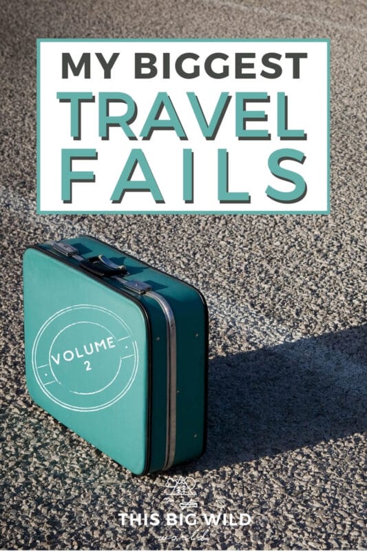 Text: My Biggest Travel Fails - Volume 2 Image: Turquoise vintage suitcase sitting in an empty parking lot, the sun casting a long shadow behind it.