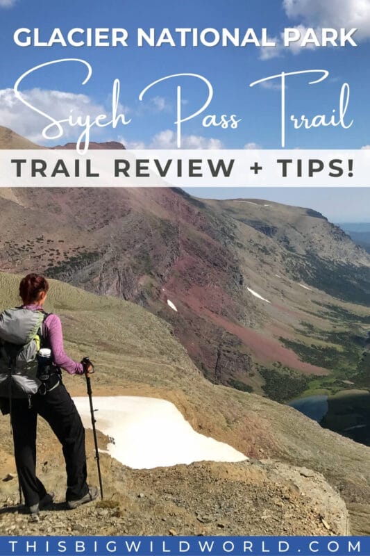 Text: Glacier National Park Siyeh Pass Trail - Trail Review + Tips! Image: Me in hiking gear with hiking poles looking off into a green valley from a partially snow covered lookout point on the Siyeh Trail in Glacier National Park.