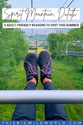 Text: Spirit Mountain, Duluth - 5 Adult-Friendly Reasons to Visit This Summer; Image: My feet stretched out while riding the chair lift at Spirit Mountain in Duluth MN with a view of Lake Superior.