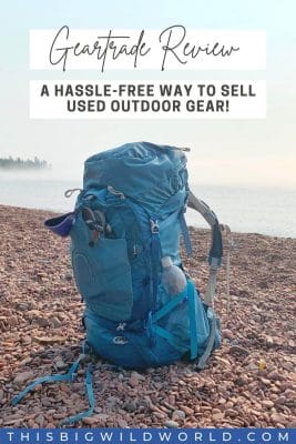 Text: Geartrade Review - A hassle-free way to sell used outdoor gear, Image: Blue backpacking backpack sitting on a rocky shore with a lake in the background.