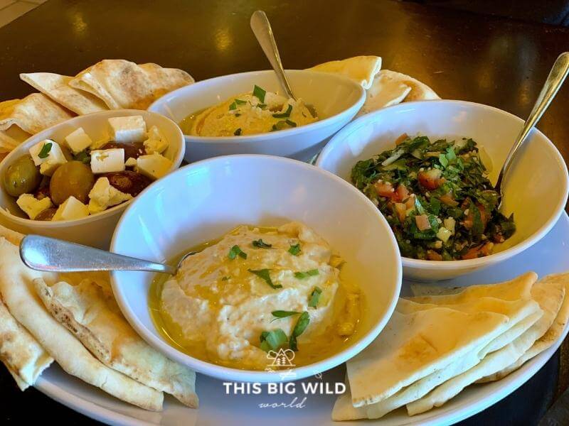 The meze appetizer from Olive's restaurant in Mankato includes hummus, baba ghanoush, tabbouleh, and marinated feta and olives served with fresh pita.