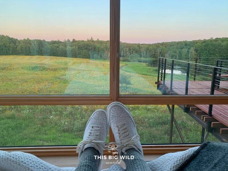 Sunset view from the main bedroom at Nordlys Airbnb in Wisconsin.