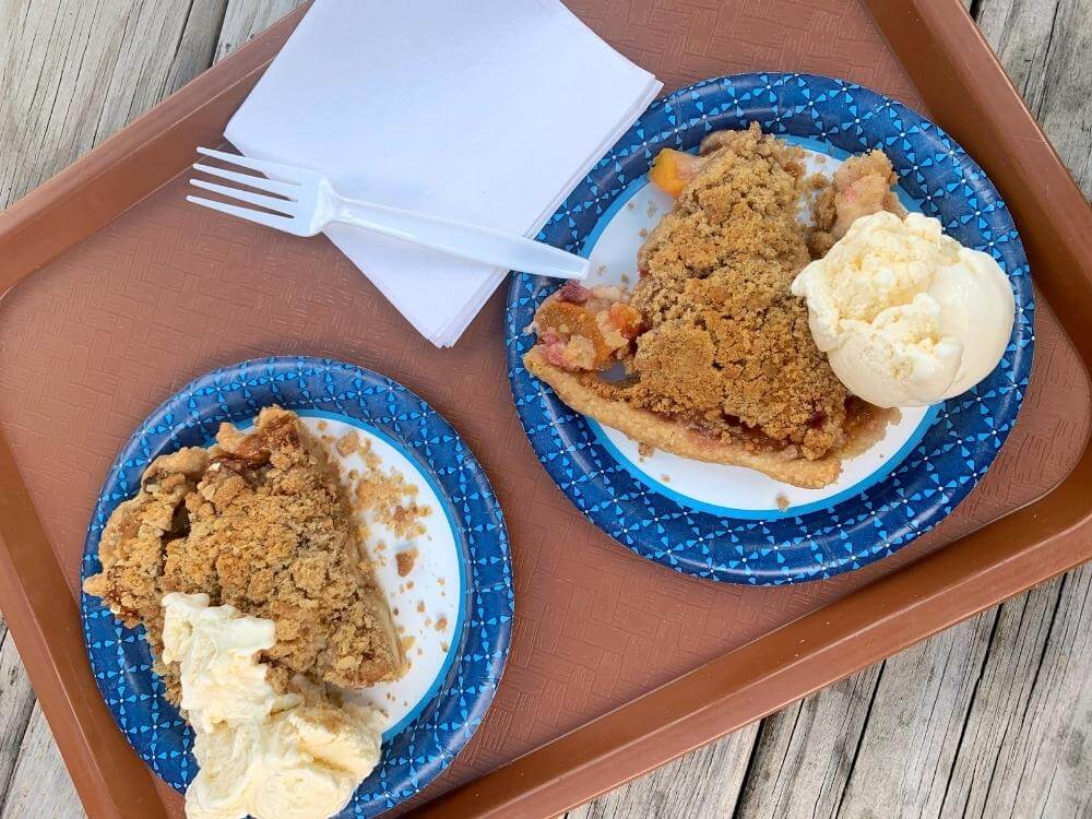 Two pieces of pie a la mode on a tray at Aroma Pie Shoppe in Whalan Minnesota.