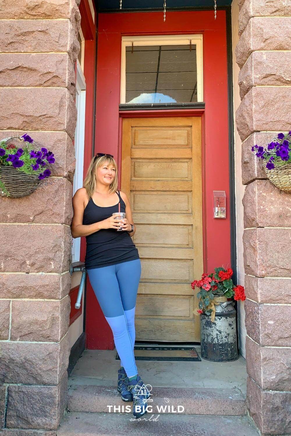 Me standing on the stone steps in front of Lingonberry's Pastry Shop.