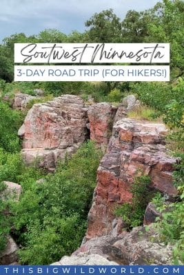 Pinkish red rock formations surrounded by greenery at Pipestone National Monument in Minnesota.