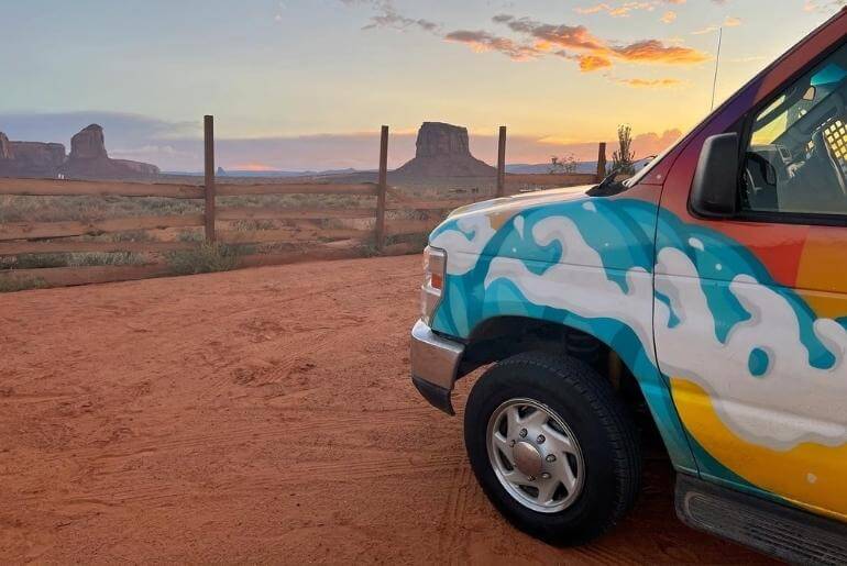 Escape Campervans rental at Monument Valley at sunset.