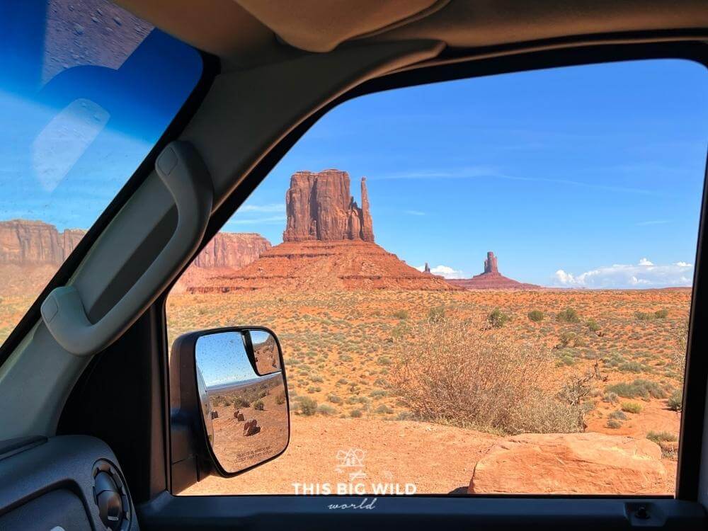 View of the rock formation in Monument Valley from the campervan window.
