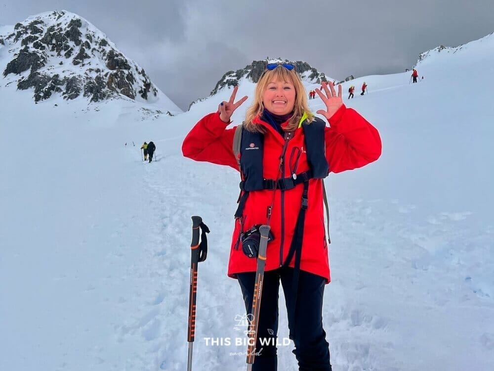 Me holding up seven fingers for my 7th continent in Antarctica.