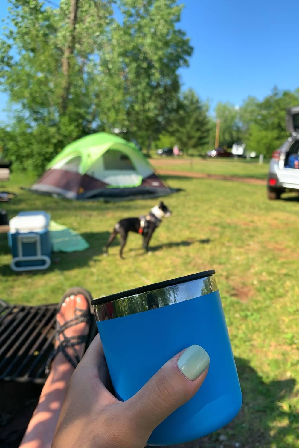 Relaxing at Portsmouth Campground, one of the best dog-friendly things to do in Crosby MN.