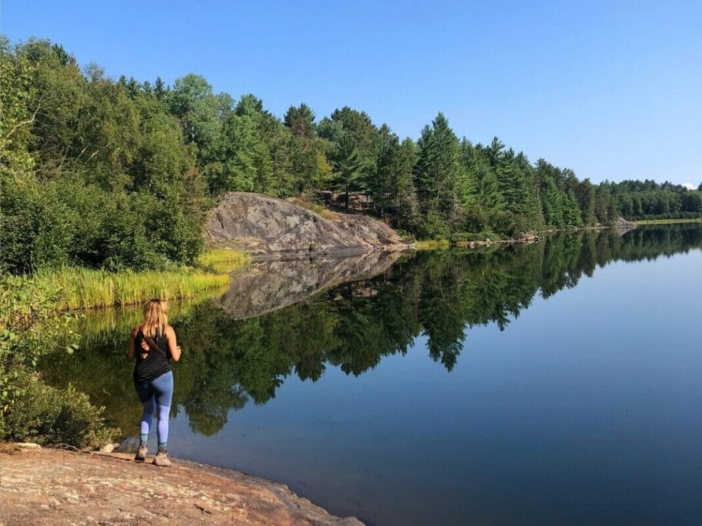 Me standing on a large rock on the shore of Bass Lake near Ely MN