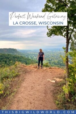 Text: Perfect Weekend Getaway La Crosse Wisconsin
Image: Me standing on top of a bluff overlooking La Crosse.